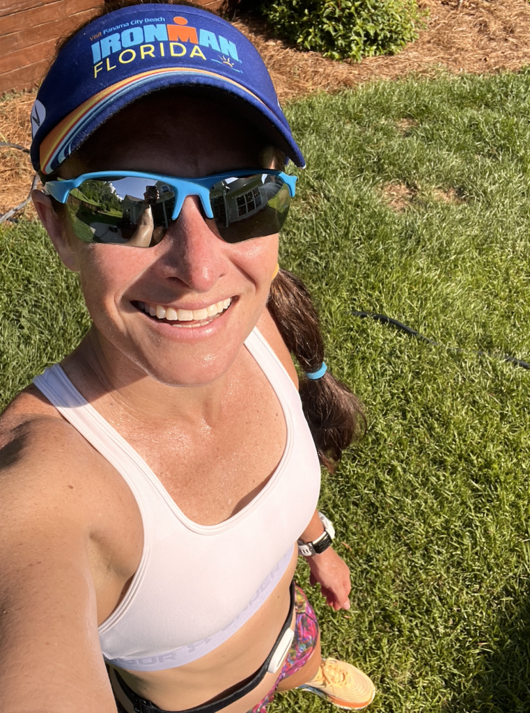 A female runner smiling after a run